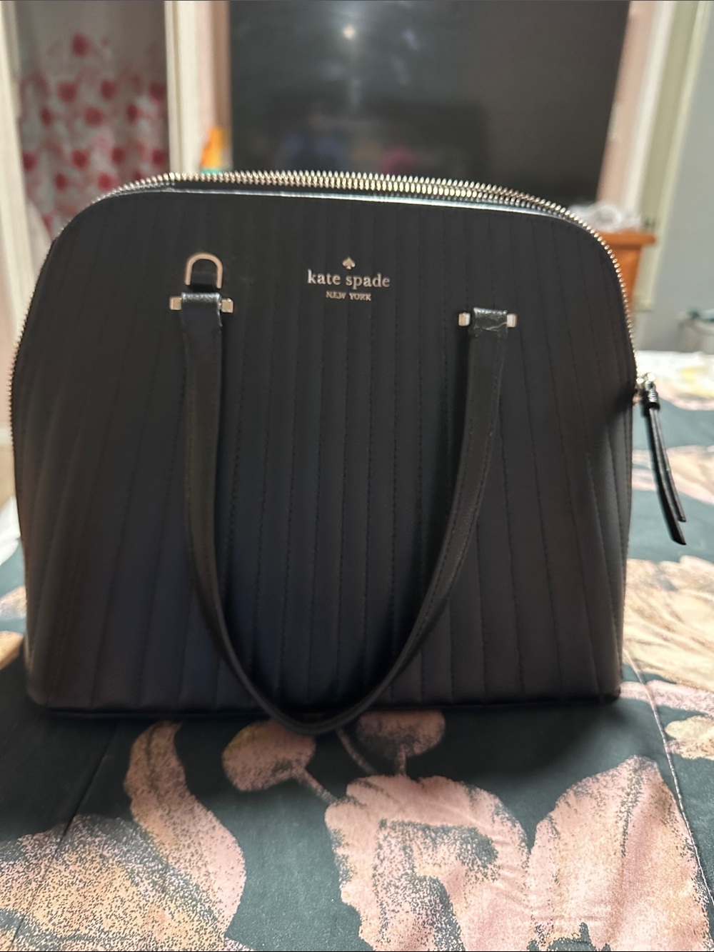 kate spade black quilted dome satchel with gold-tone logo